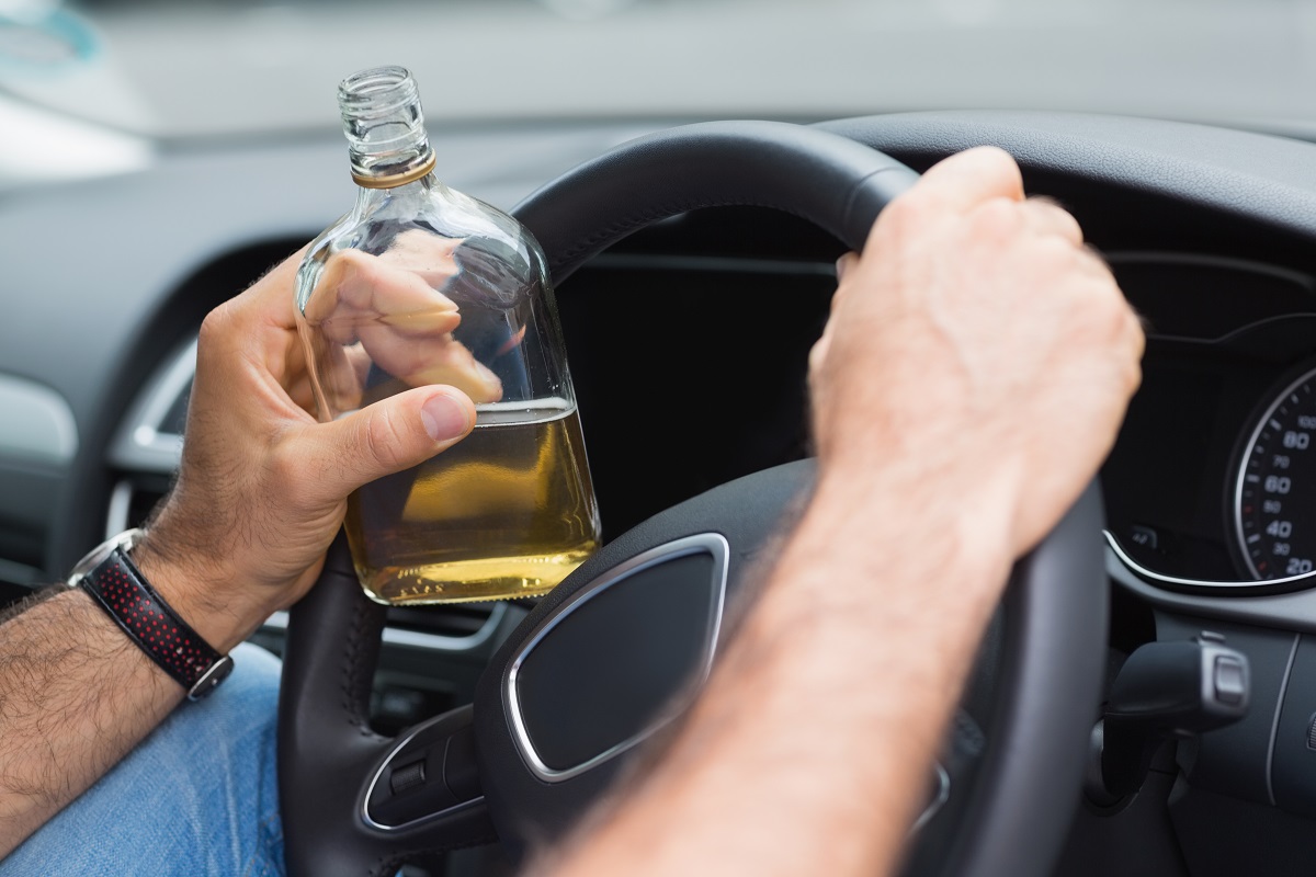 Man drinking and driving.jpg