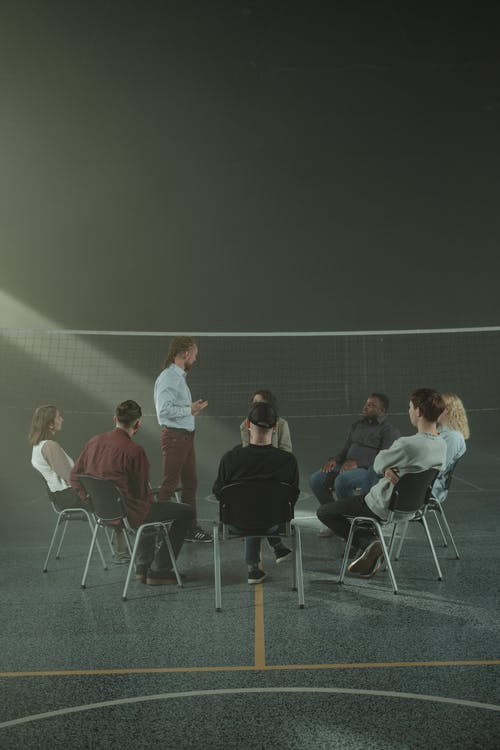 Free Group of People in a Group Therapy Stock Photo