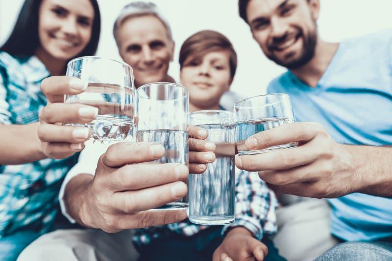 A group of people holding glasses of water

AI-generated content may be incorrect.