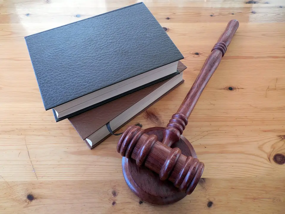 Adam M Smith on The Skills Which You Must Have To Become a Judge | My Zeo Judge’s gavel and law books on a wooden table.