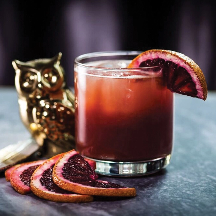 10 Amazing Tequila Cocktails That Are Not A Margarita | My Zeo Glass of tequila cocktail with blood orange slices.